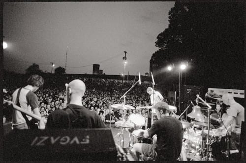 Fugazi performs at Fort Reno in 2002. Courtesy dischord.com