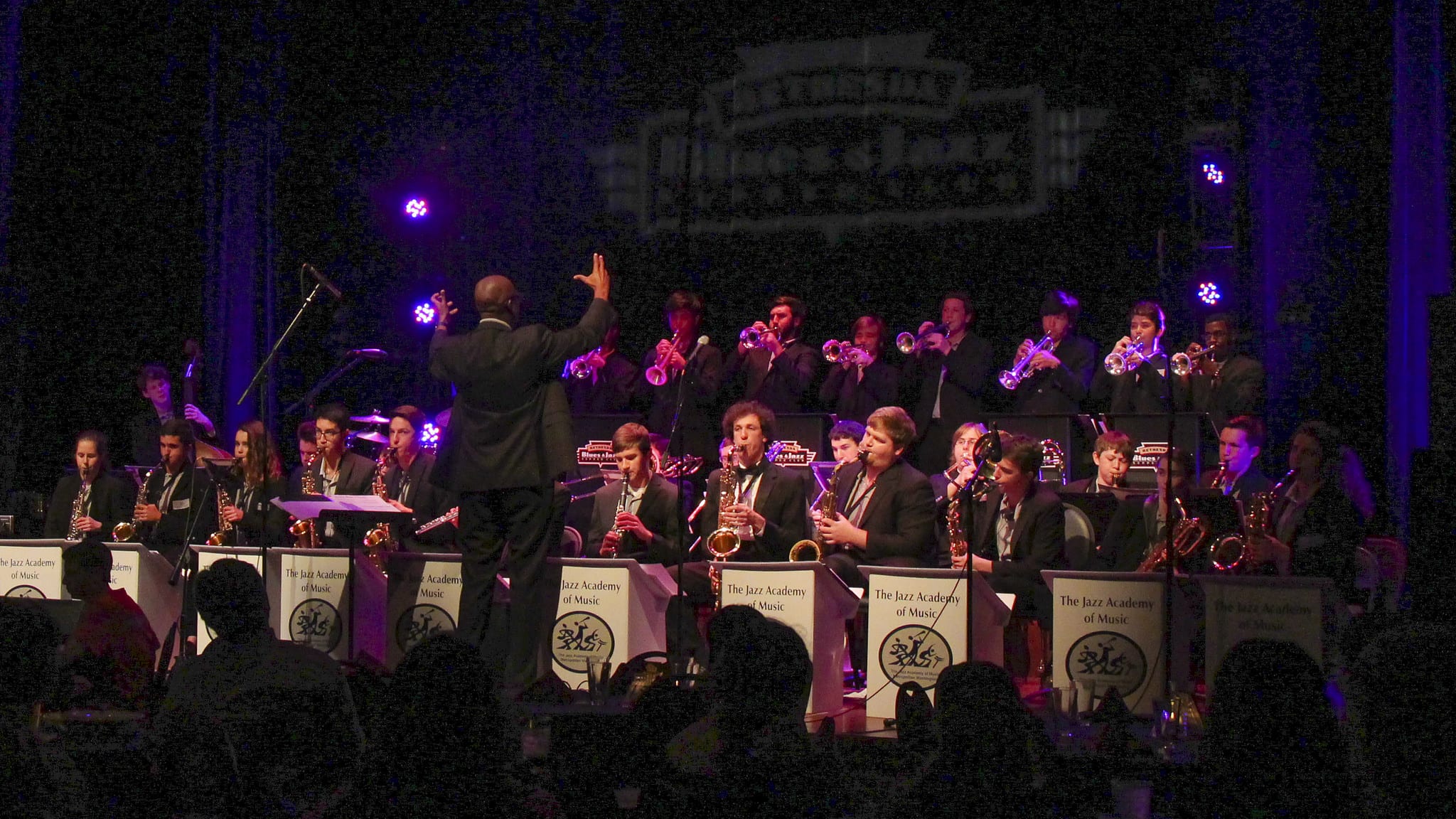 The saxophonist and educator Paul Carr leads his Jazz Academy of Music big band in a 2016 concert at Bethesda Blues & Jazz. Courtesy woodleywonderworks/flickr